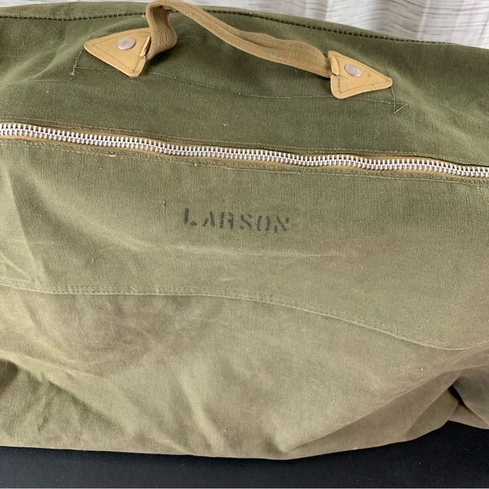 Green Olive Drab Zippered Canvas Duffle Bag.